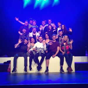 Cast pic before show waving